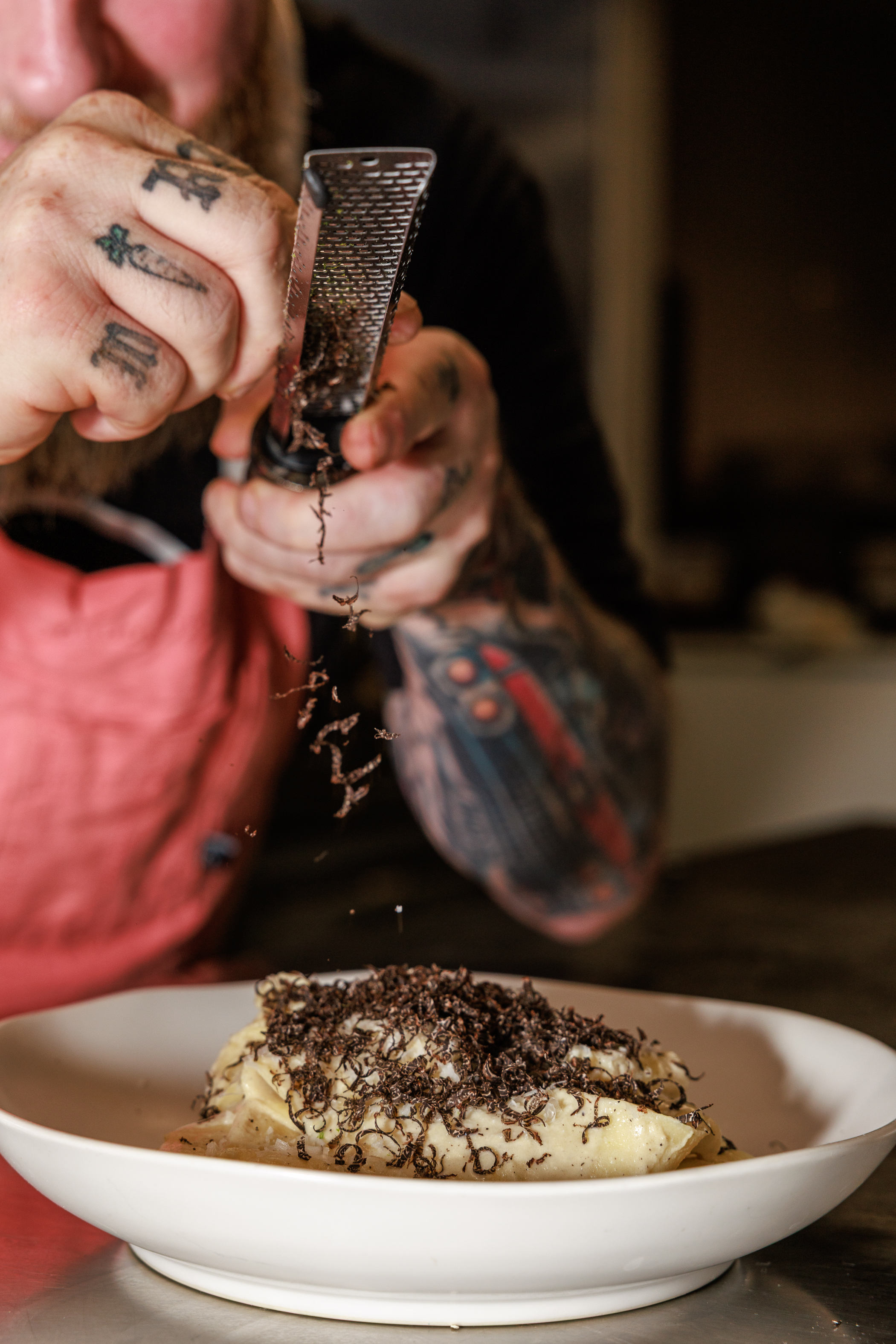 Chef Michael shaving fresh black truffles tableside at The Salty Zebra Bistro